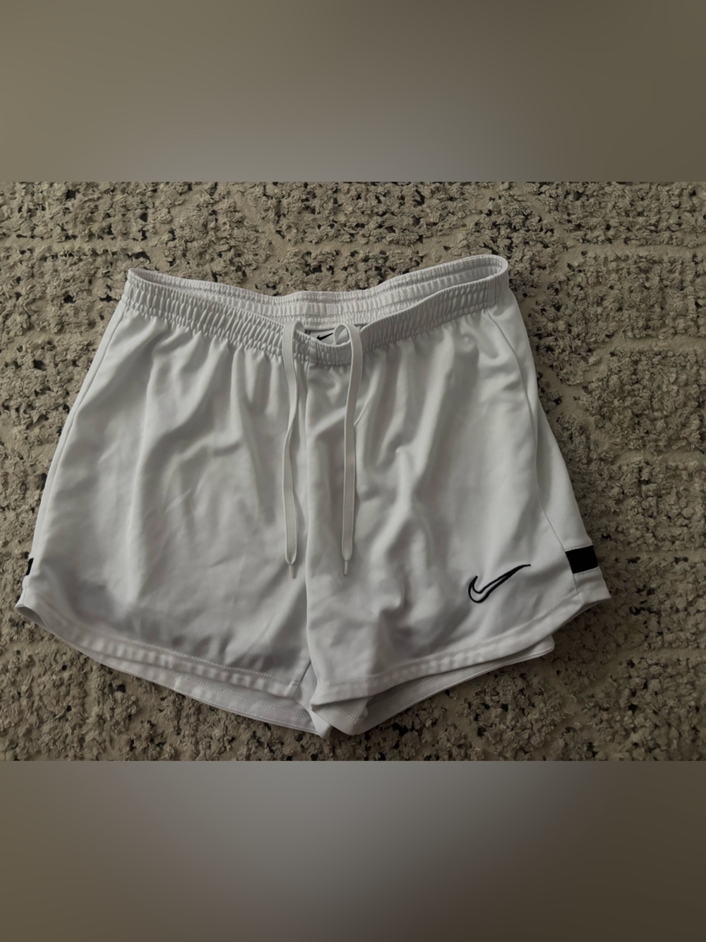 Nike White Shorts with Black Swoosh